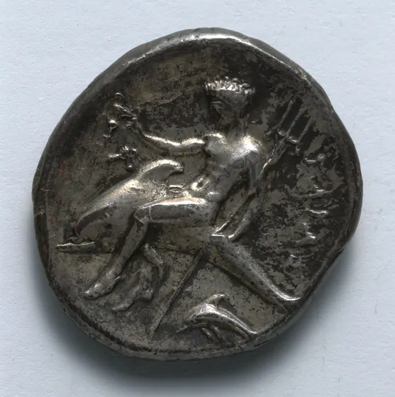 Monnaie d'argent de Tarente : Taras à cheval sur un dauphin, son trident à la main
